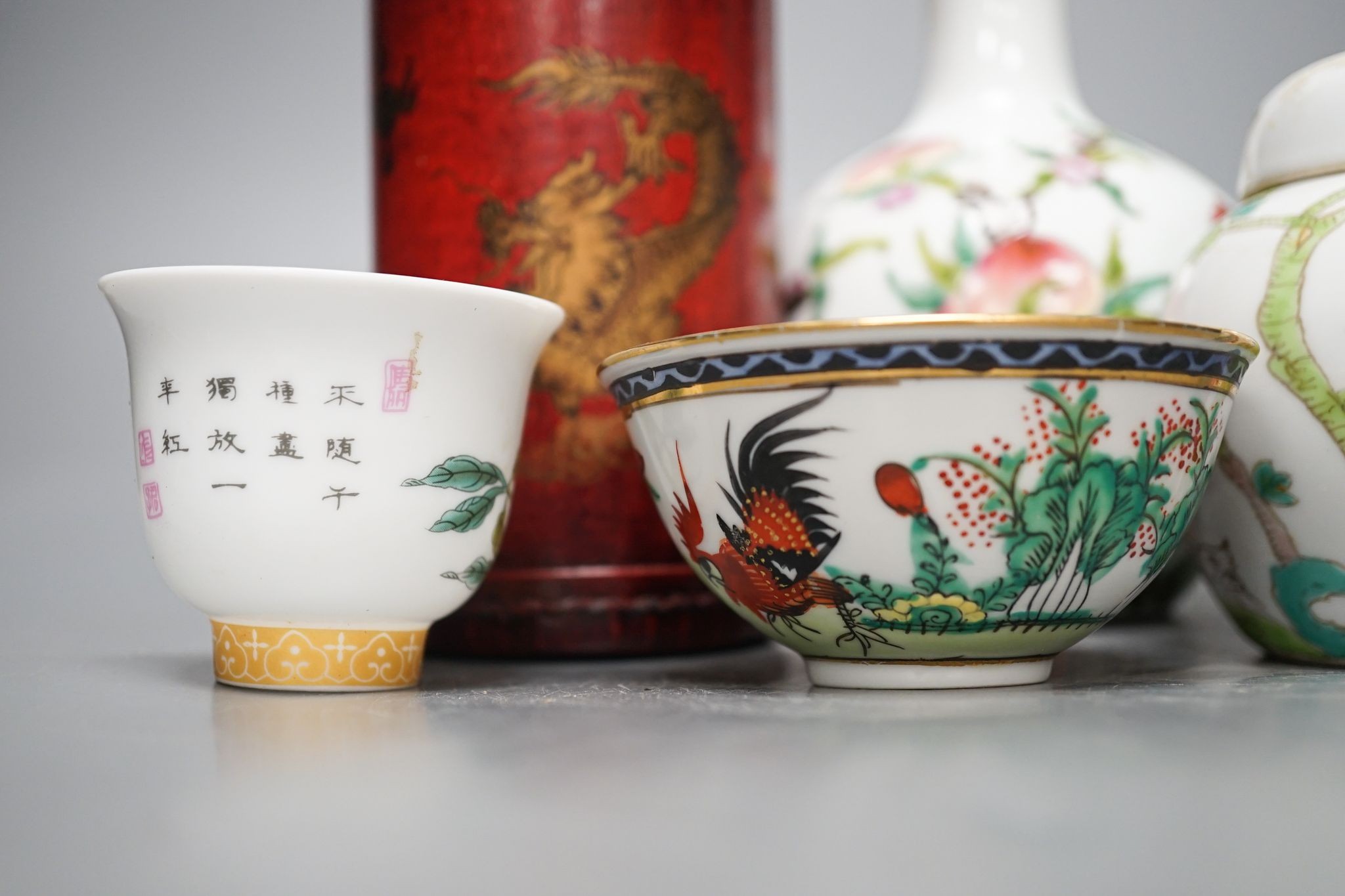 A pair of Chinese famille rose ‘peach’ bottle vases, 17cm, a ‘phoenix’ jar and cover, two porcelain cups and a boxed set of bamboo tallies or counters (6)